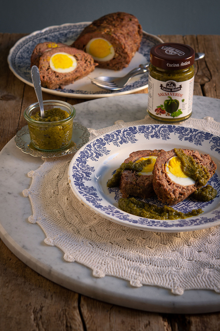 Meatloaf with hard-boiled eggs and green sauce 