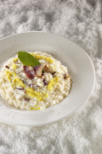 Stracchino risotto with smoked goose breast and pear and ginger sauce